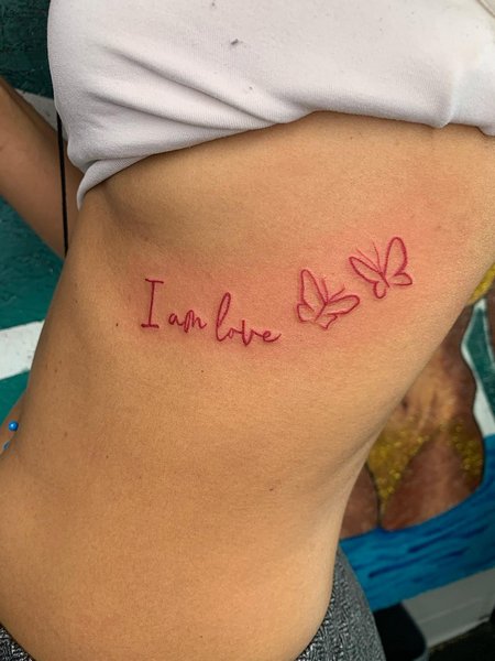 Red ink Side Boob Tattoo