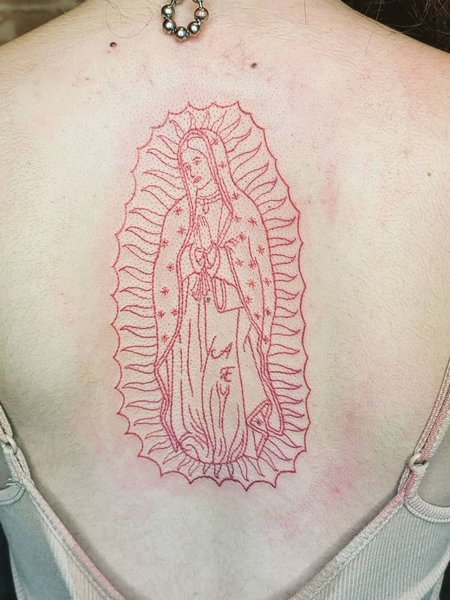 Red ink Virgen De Guadalupe Tattoo