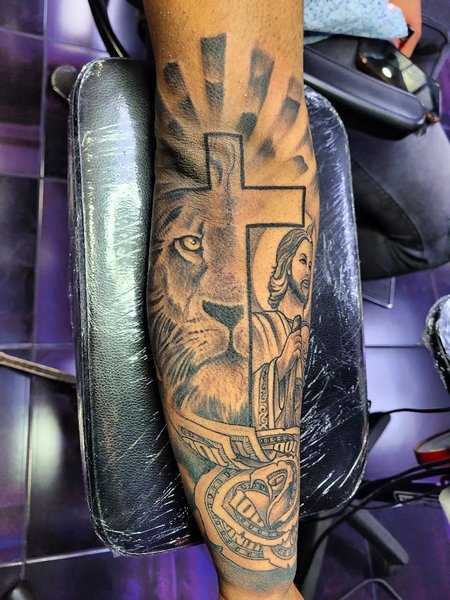San Judas Cross And Lion Tattoo