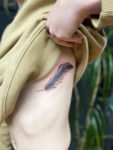 Side Boob Feather Tattoo