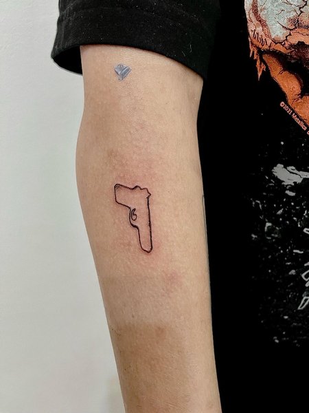 Simple Gun Tattoo