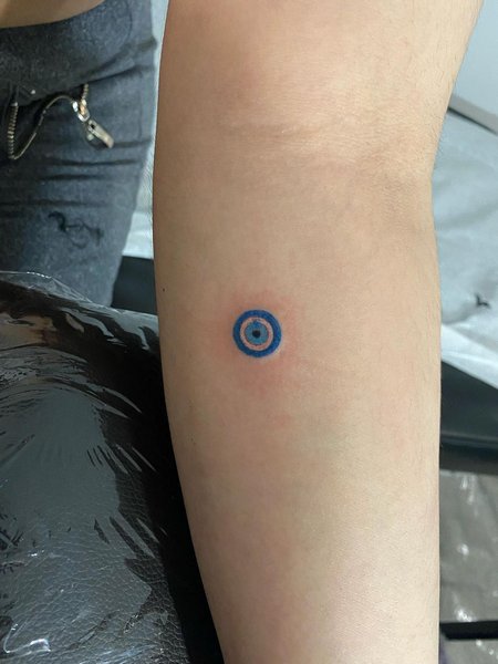 Small Blue Evil Eye Tattoo