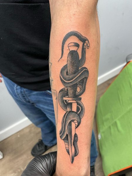 Snake And Dagger Tattoos