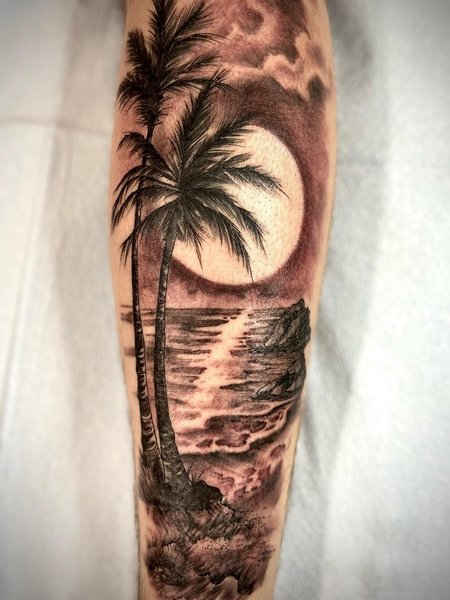 Sun And Palm Tree Tattoo