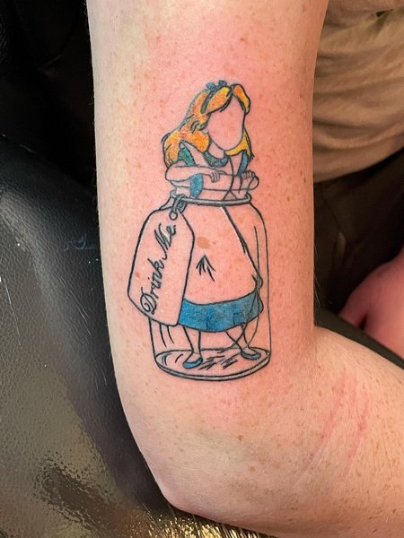 Tiny Alice In Wonderland Tattoo