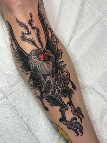 Traditional Mothman Tattoo