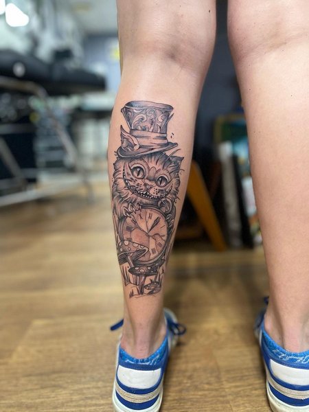 Alice In Wonderland Calf Tattoo