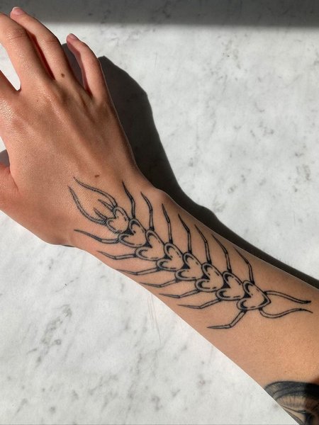 Centipede Tattoo On Wrist