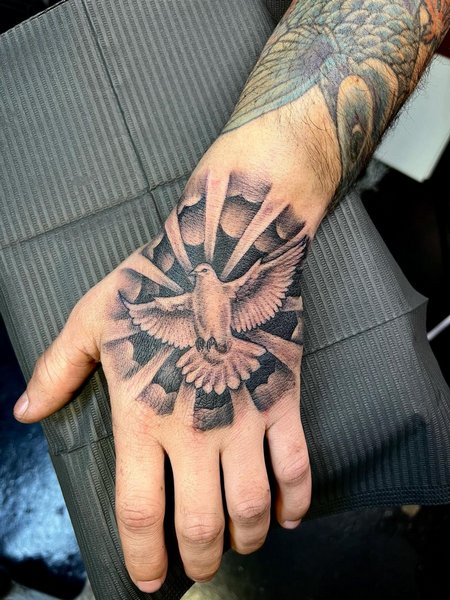 Dove Hand Tattoo