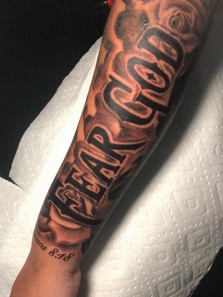 Fear God Forearm Tattoo