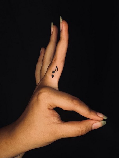 Music Note Tattoo On Finger