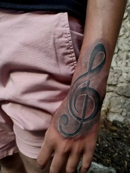 Music Note Tattoo On Hand