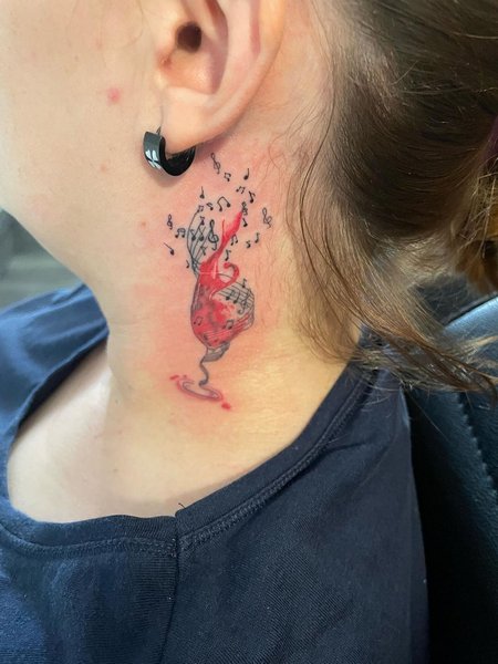 Music Note Tattoo On Neck