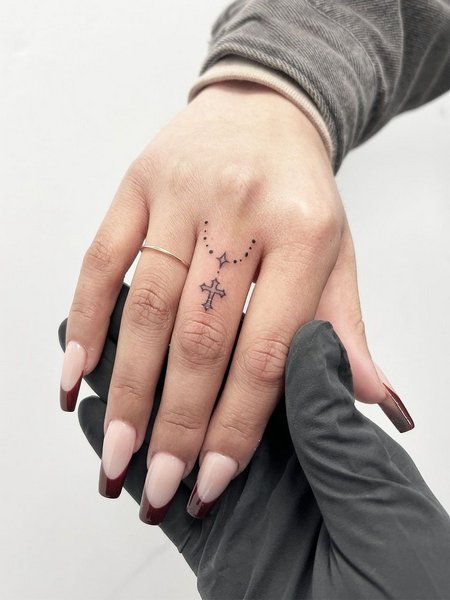 Rosary Finger Tattoo