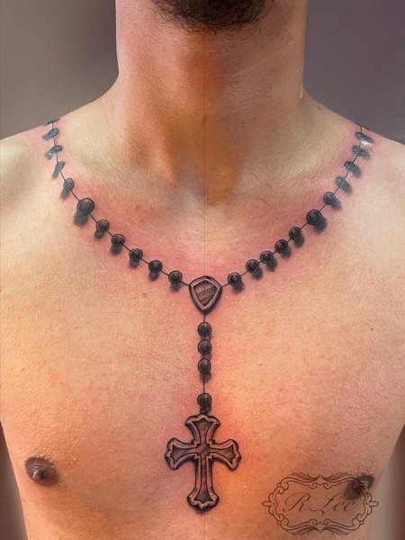 Rosary Tattoo On Chest