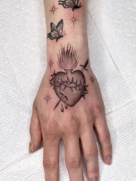 Sacred Heart Hand Tattoo