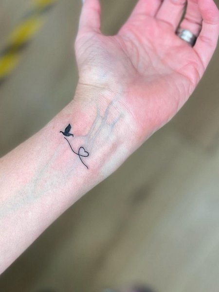 Simple Dove Tattoo