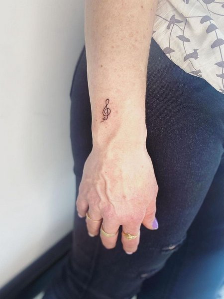 Simple Music Note Tattoo