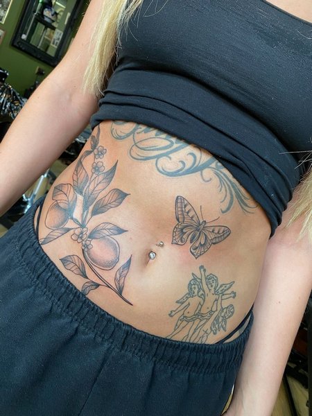 Stomach Tattoos For Girls