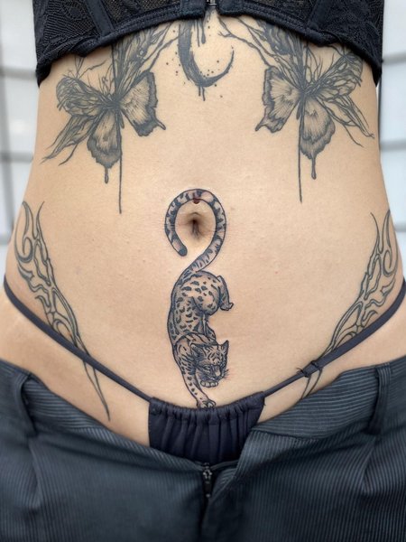 Tattoo On The Stomach