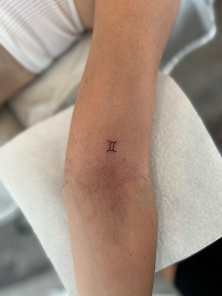 Tiny Gemini Tattoo