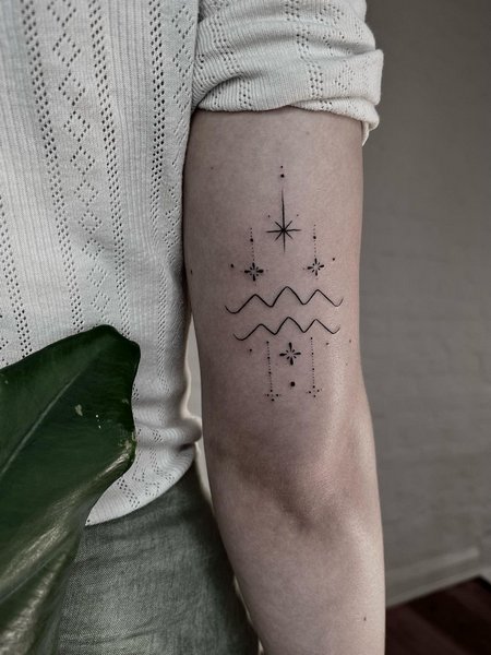 Aquarius Arm Tattoo