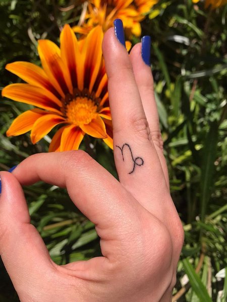 Capricorn Finger Tattoo