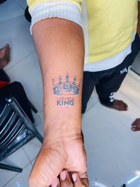 Crown Wrist Tattoo