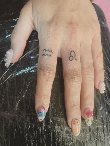 Leo Finger Tattoos