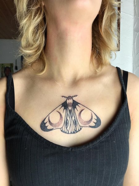 Moth Chest Tattoo
