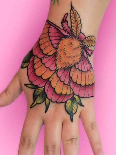 Moth Hand Tattoo