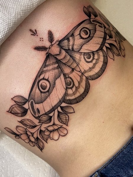 Moth Sternum Tattoo