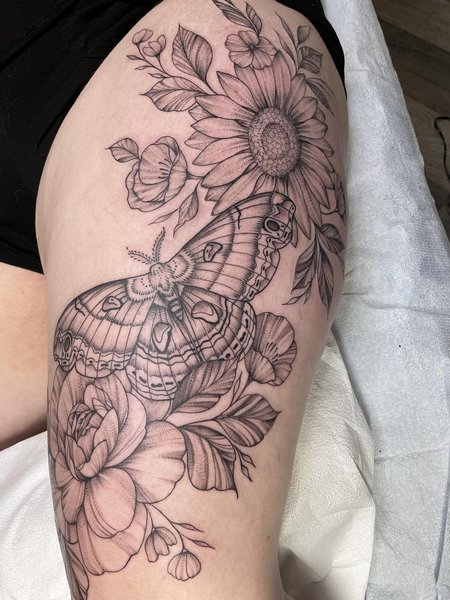 Moth Thigh Tattoo