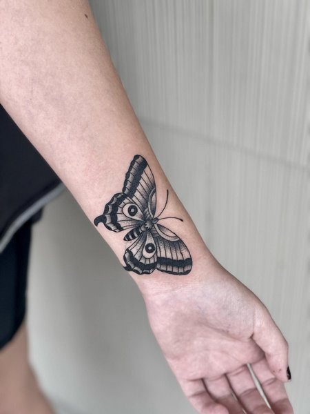 Moth Wrist Tattoo