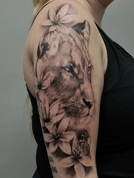 Female Shoulder Lioness Tattoo
