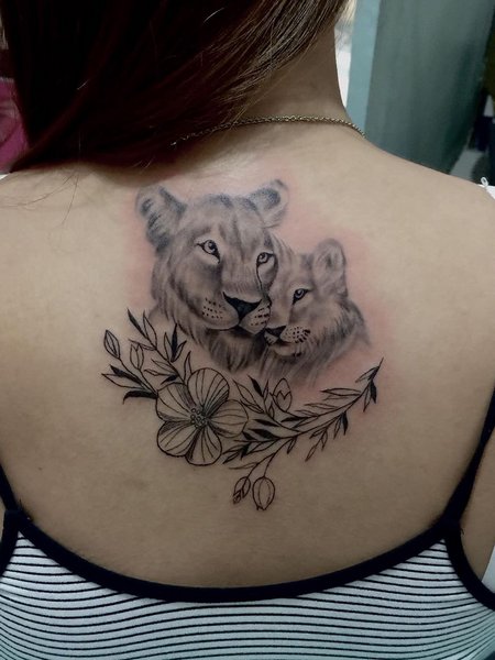 Feminine Lioness Tattoo