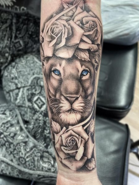Lioness And Rose Tattoo