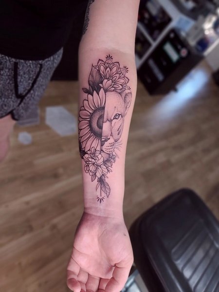 Lioness Arm Tattoo