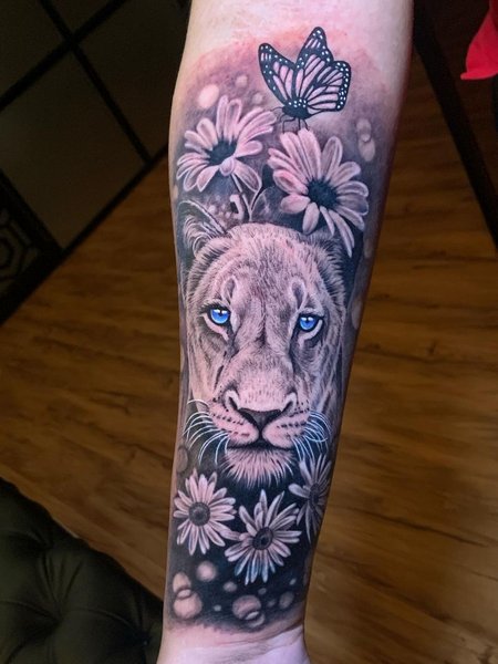 Lioness Forearm Tattoo