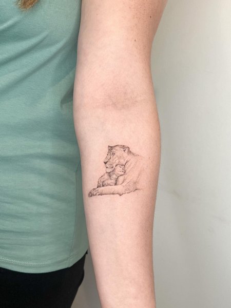 Minimalist Lioness Tattoo