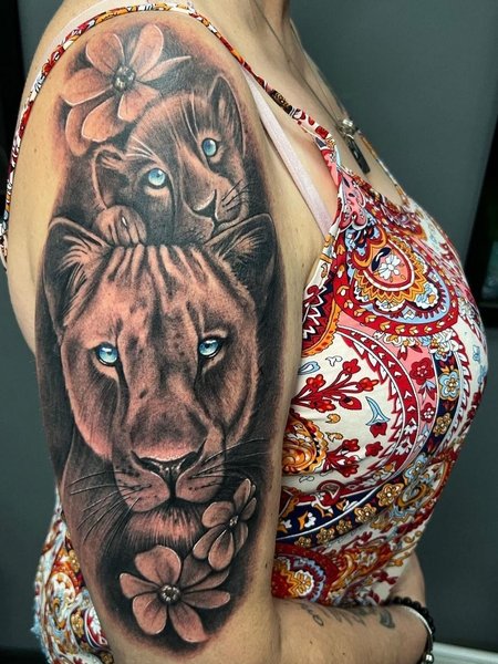 Realistic Lioness Tattoo